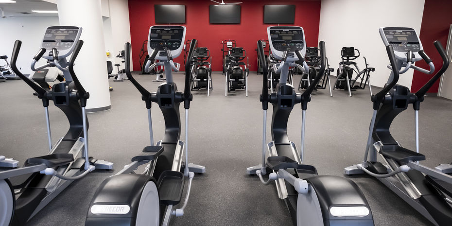 Rows of treadmills in on-campus recreation facilities. 