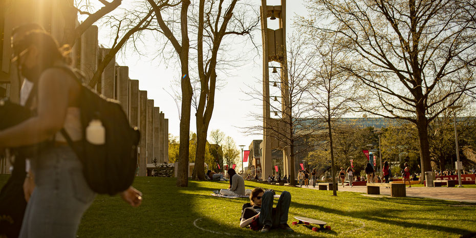Temple students walk past the Bell Tower on Main Campus.