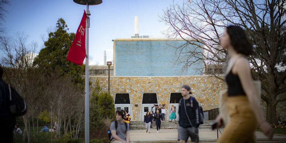 Students walking on temple campus in early spring