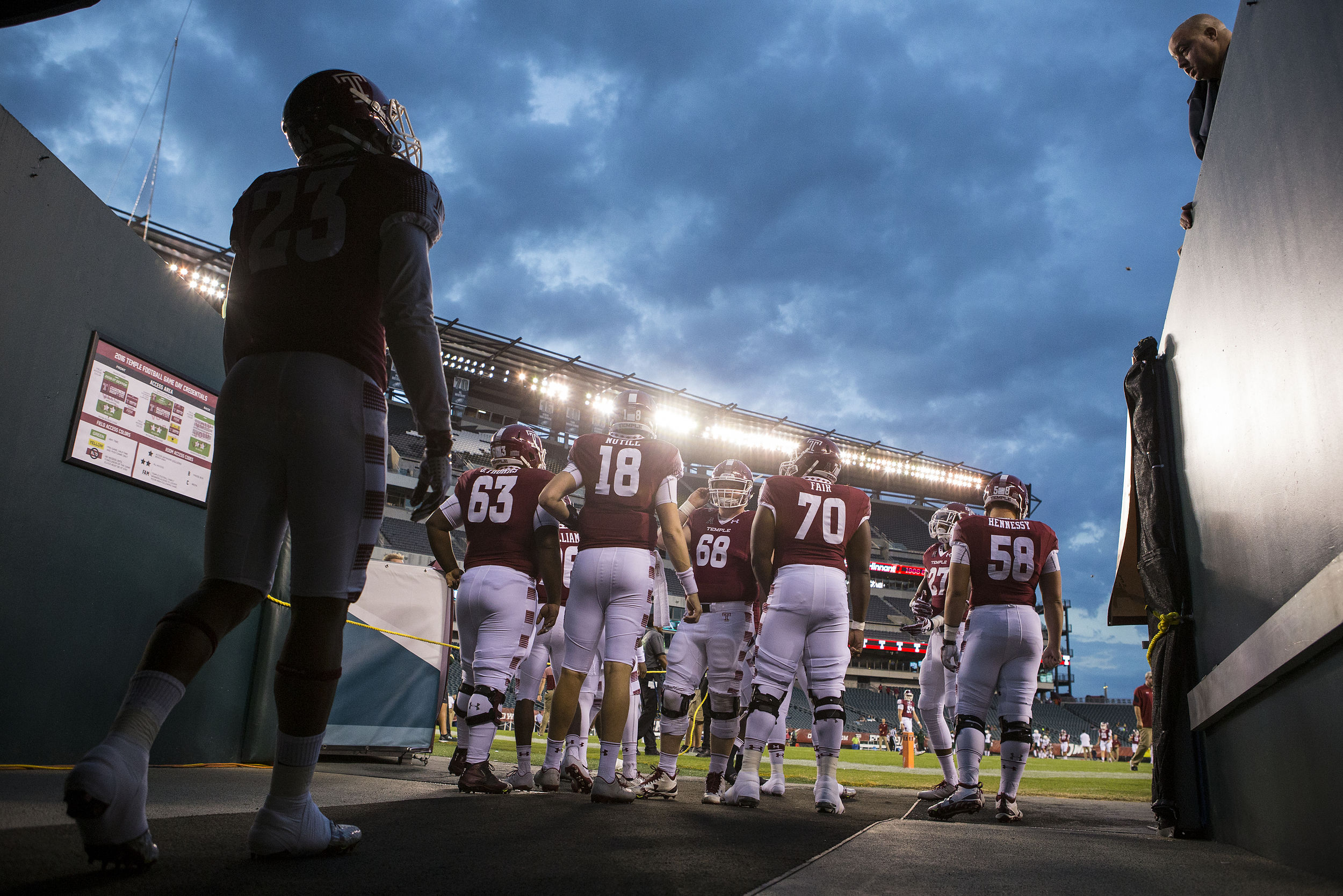 Temple University's football team exits the tunnel pre-game.