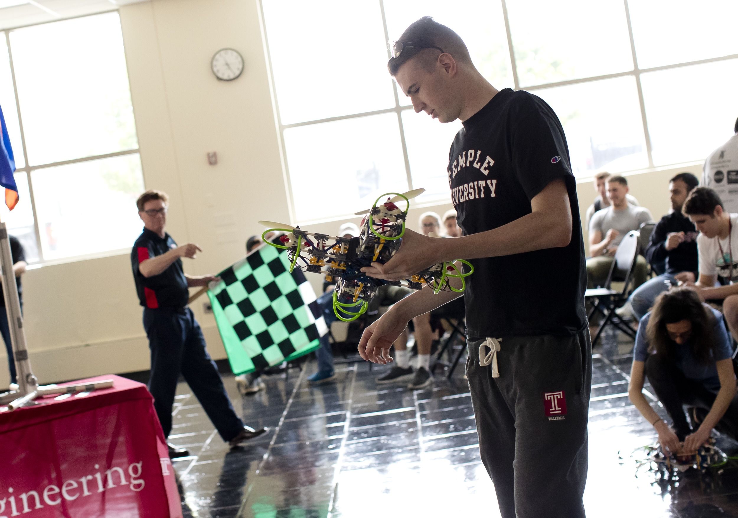 Students participate in a quadcopter race competition.