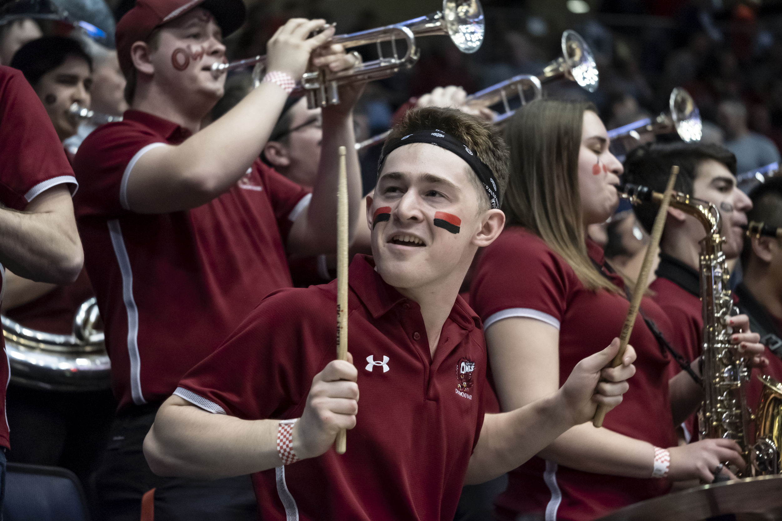 A member of Temple's band plays at an athletics event.