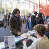 Student visits a table for more information about global studies.
