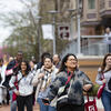 Crowd of students and families walking on campus