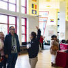 Students and families talking with Temple representatives