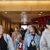Experience Temple Day attendees in hallway